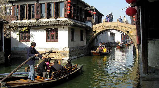 About 1.5 hours west of Shanghai, Suzhou is known as the "Venice of China" with its canals and stone bridges.  Like in Venice, you can take a riverboat ride on the canals.  

Our boat was steered by an extremely strong little old man who serenaded us by singing Chinese opera.  

Built in 514 BC, Suzhou is an ancient city with a 2500 years' history. The unique characteristics of the past are still retained in present-day Suzhou. The double-chessboard layout of Suzhou, with 'the streets and rivers go side by side while the water and land routes run in parallel', are preserved basically intact. Strolling the streets, you can feel the unique lingering charm of this landscape left by its long history.

#weekendgetaway
