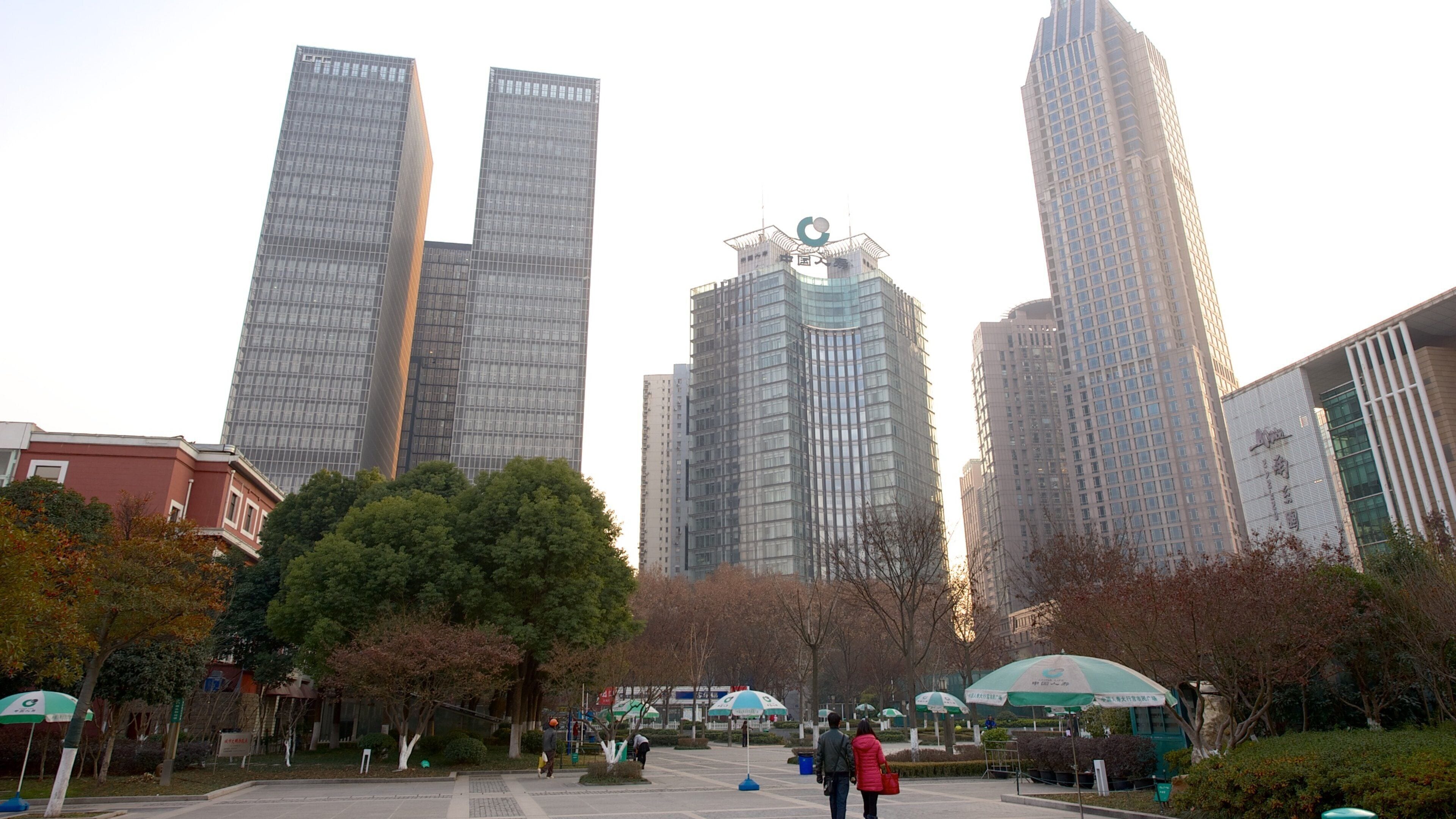 Nanjing which includes a square or plaza, a skyscraper and a city