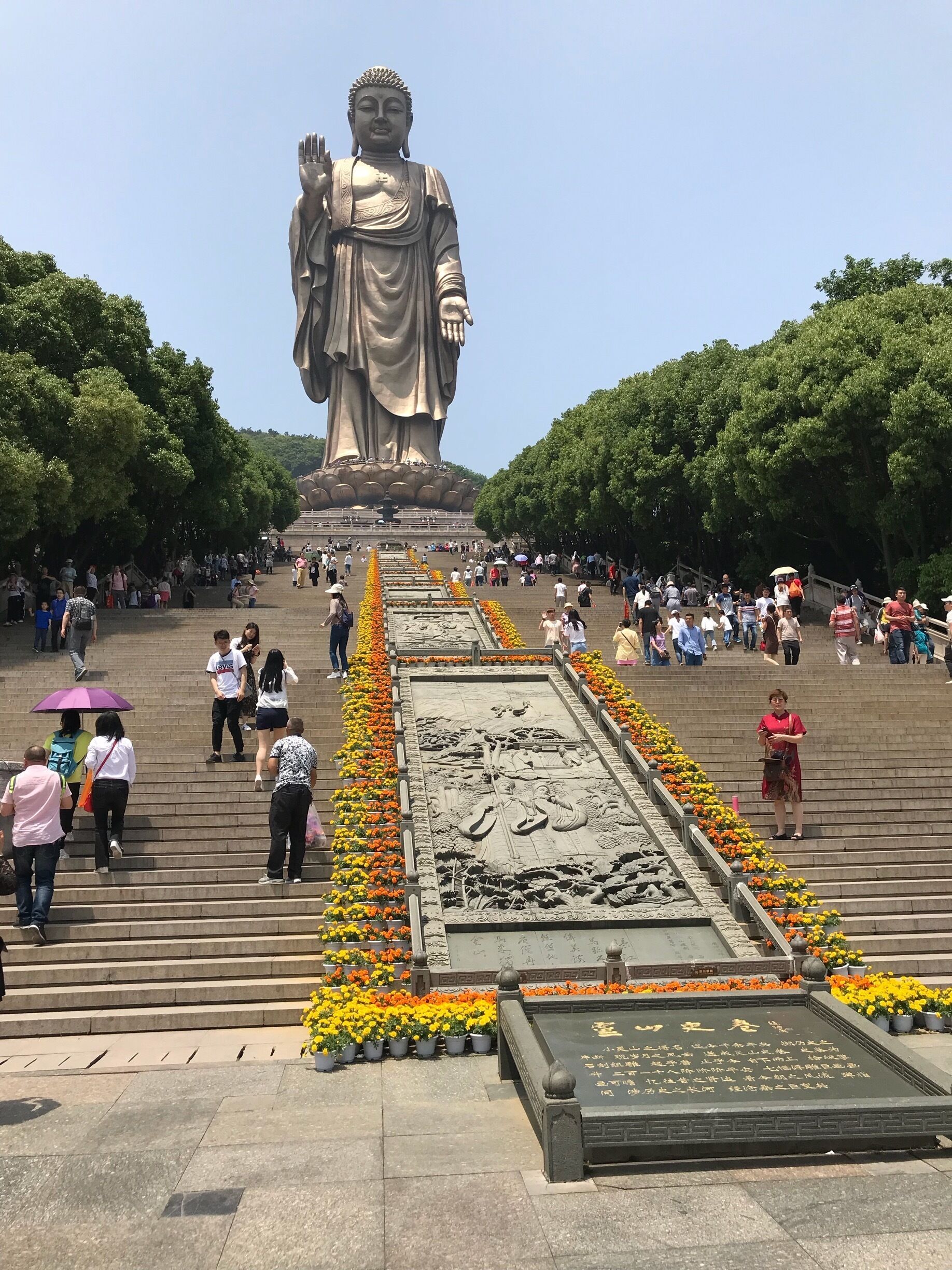 The Ling Shan giant Buddha statue is one of the largest in the world at 88m tall.  It is located near Wuxi and is a favorite spot for local tourists and the occasional foreign tourist.  The views from the top of the hill and base of the statue are worth the 217 steps up.