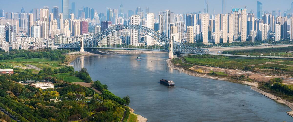 Aerial daytime view of Hankou CBD alongside Han River waterfront, Wuhan, Hubei, China