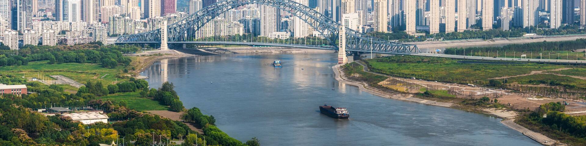 Aerial daytime view of Hankou CBD alongside Han River waterfront, Wuhan, Hubei, China