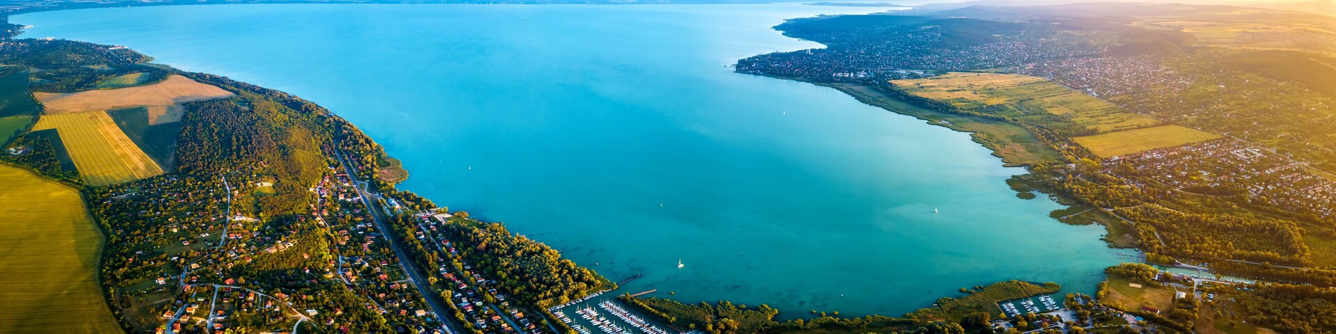 Balatonfuzfo, Hungary - Panoramic aerial skyline view of the Fuzfoi-obol of Lake Balaton at sunset. This view includes Balatonfuzfo, Balatonalmadi, Balatonkenese and several yacht marinas