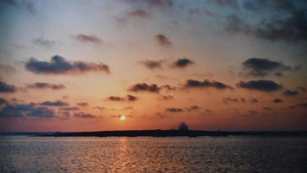 A small island in the distance - my dad told me they used to swim over there, his brothers and himself, when they were young. Or do they still..? //Analogue shot on Kodak200 #LifeatExpedia