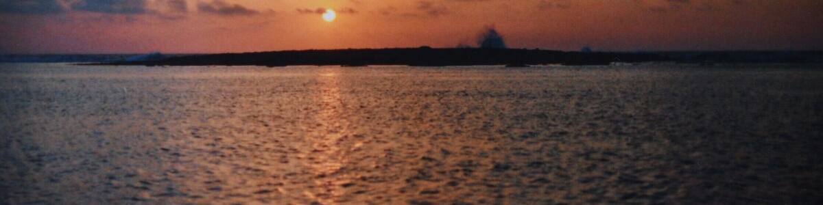 A small island in the distance - my dad told me they used to swim over there, his brothers and himself, when they were young. Or do they still..? //Analogue shot on Kodak200 #LifeatExpedia