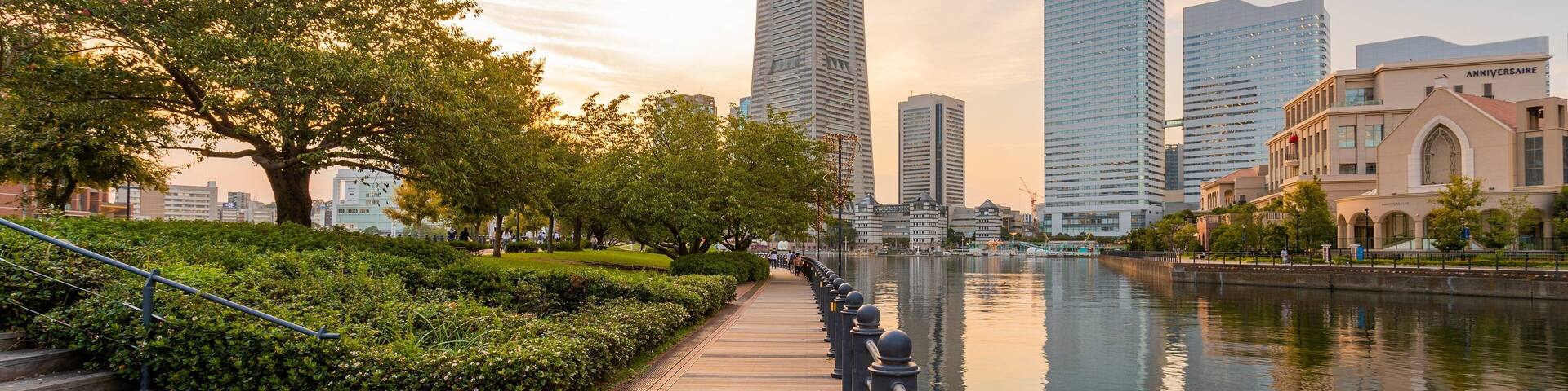 Sakuragichō featuring a river or creek, a high rise building and a sunset