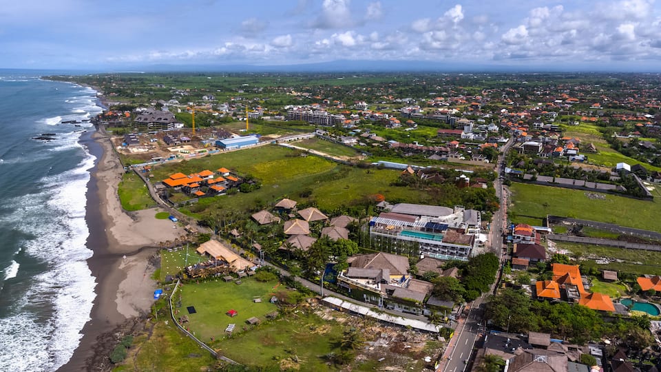 Aerial panorama of the western balinese coast near the village of Canggu. Echo beach visible on the left. Indonesia