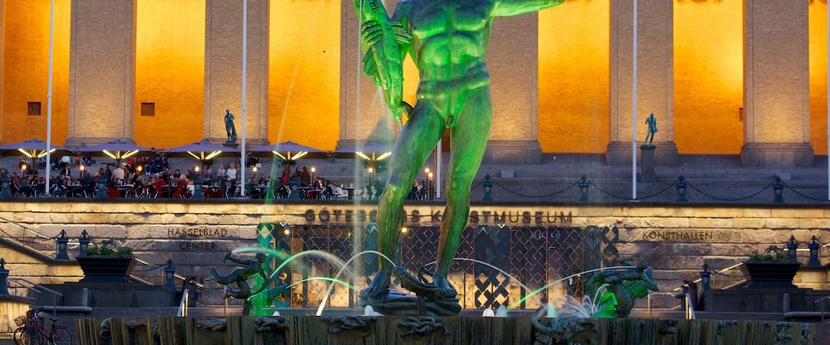 Gothenburg which includes a fountain, a statue or sculpture and night scenes