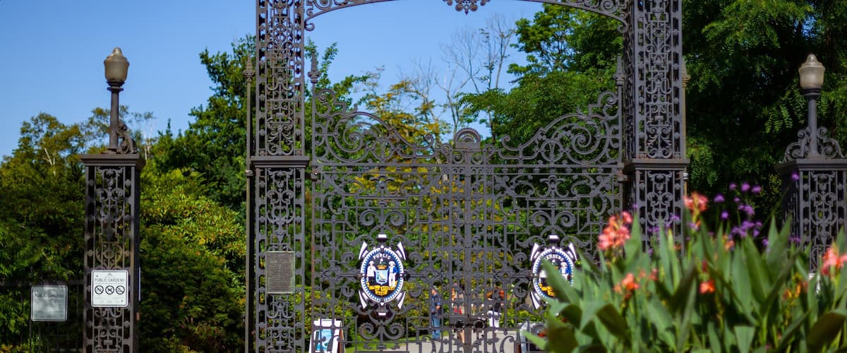Halifax Public Gardens showing a garden and signage