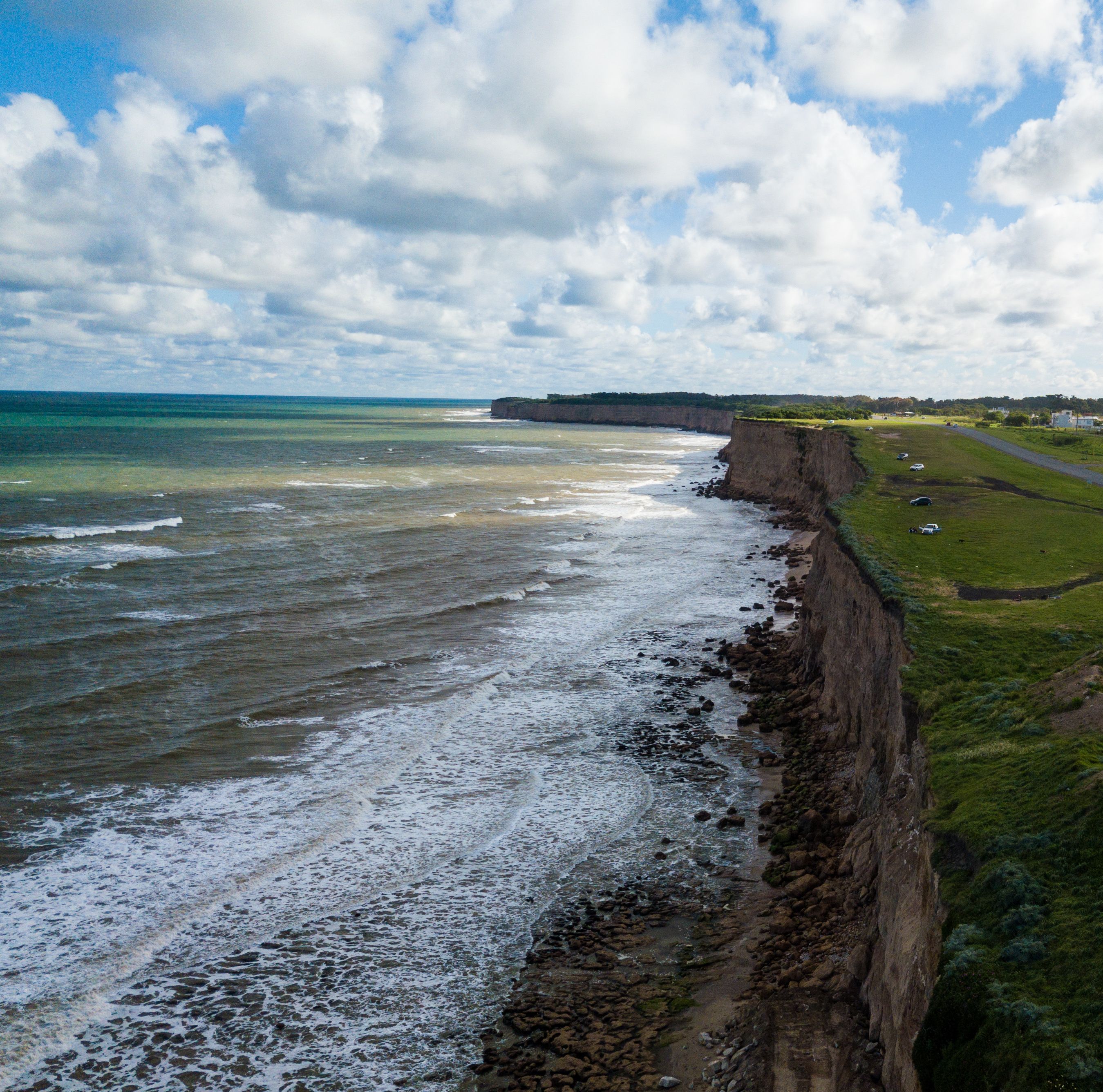 Cliffs at Acantilados near Mar del Plata Argentina – high resolution drone photos of the Argentinian coast Mar del Plata Casino Central in spring.  Buenos Aires Capital Federal district  