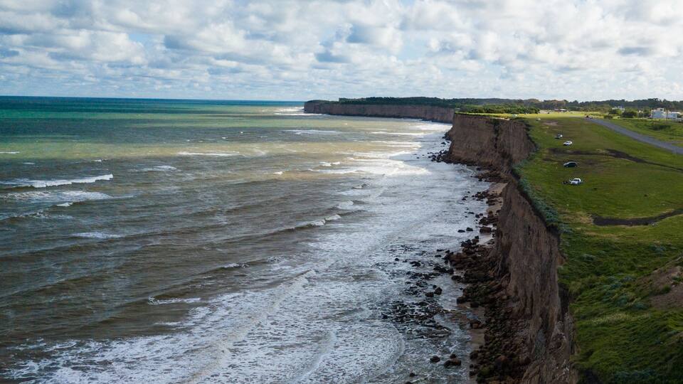 Cliffs at Acantilados near Mar del Plata Argentina – high resolution drone photos of the Argentinian coast Mar del Plata Casino Central in spring. Buenos Aires Capital Federal district