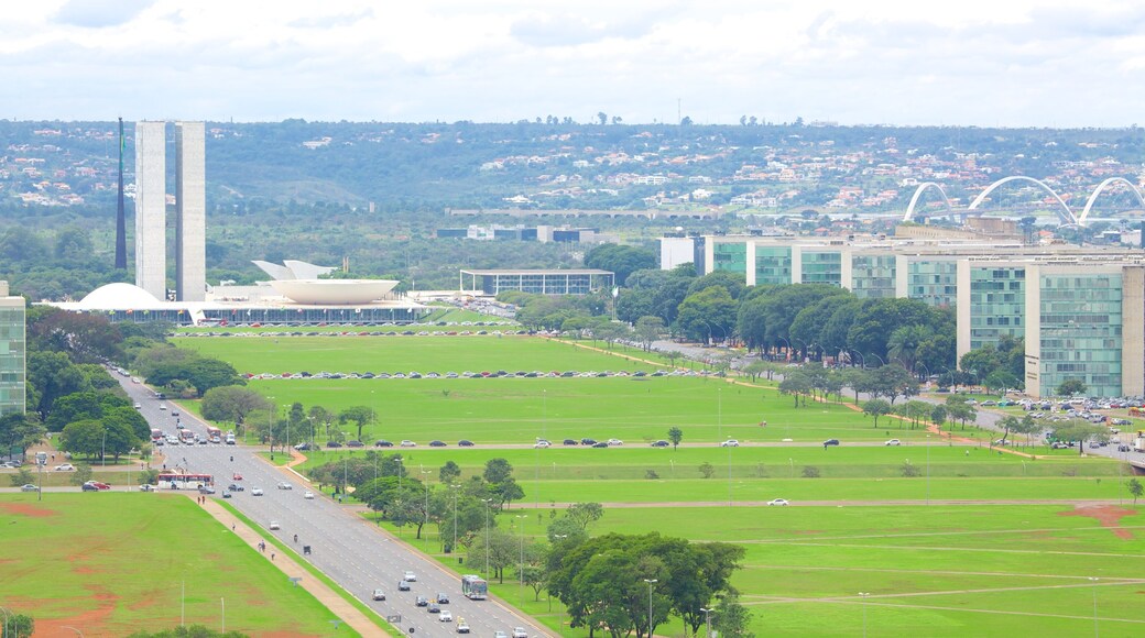 Brasilia showing a garden, modern architecture and a monument