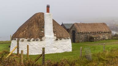 Scotland, Hebrides. Isle of North Uist. Struan Cottage, near Solas. Traditional thatched cottage.