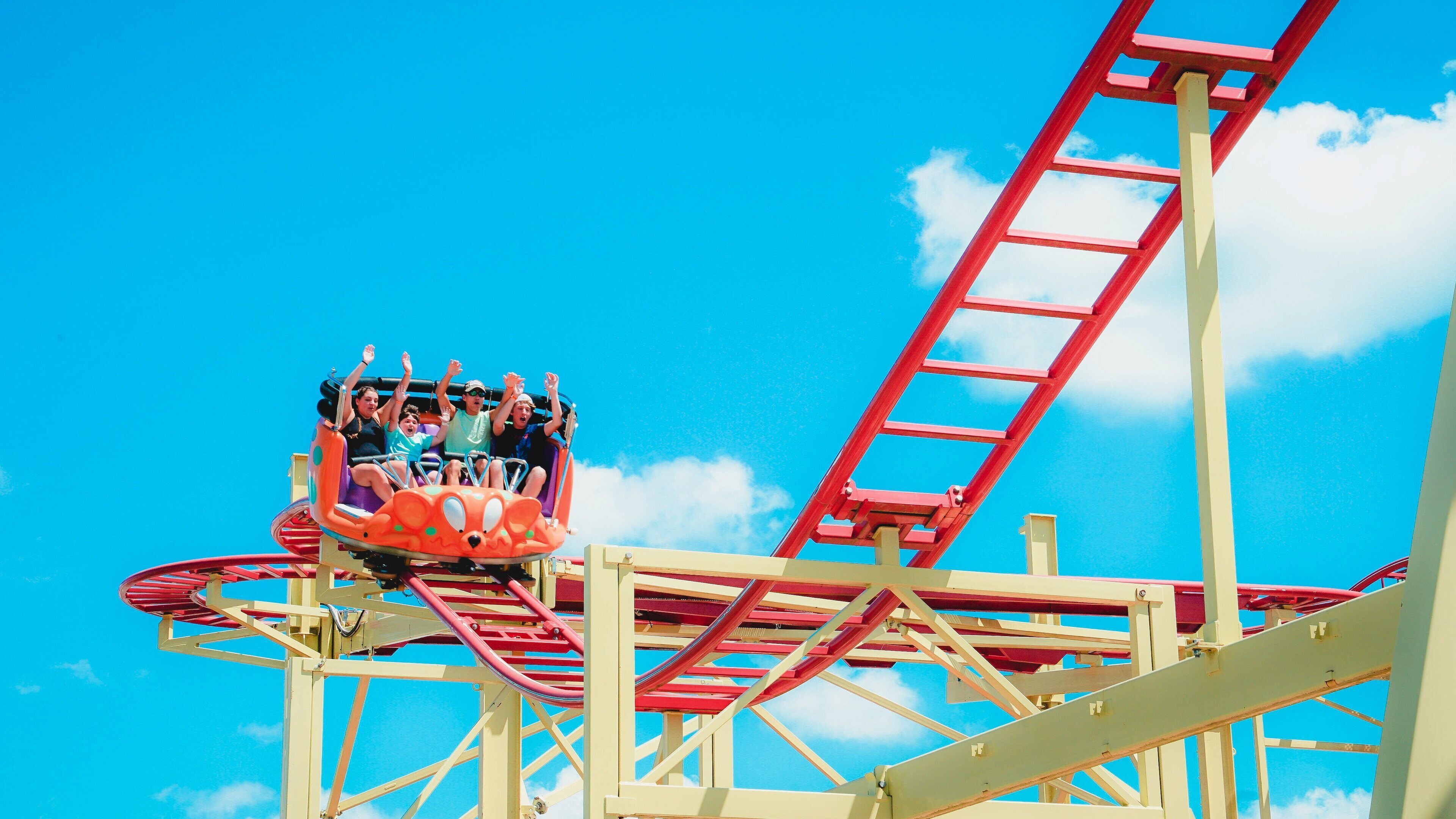 The Park at OWA featuring rides as well as a small group of people