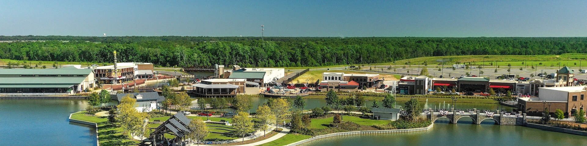 The Park at OWA featuring a lake or waterhole and landscape views