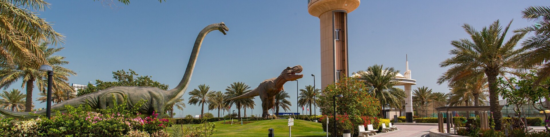 Prince Khalifa Bin Salman Park showing a garden and outdoor art