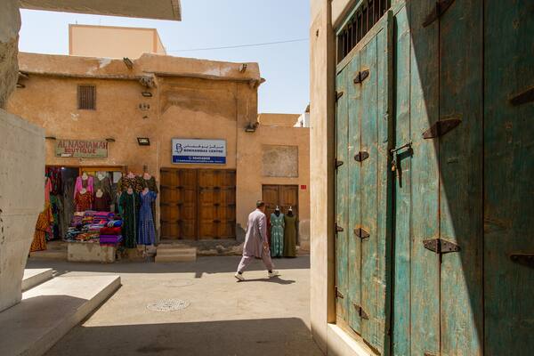 Muharraq Souq featuring street scenes as well as an individual male