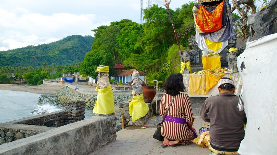 Lombok featuring religious aspects, general coastal views and a temple or place of worship