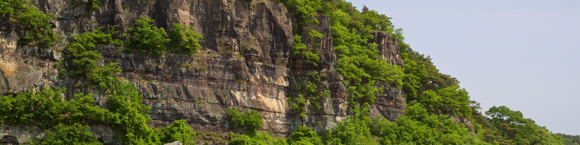 Buyongdae Cliff showing a river or creek and mountains