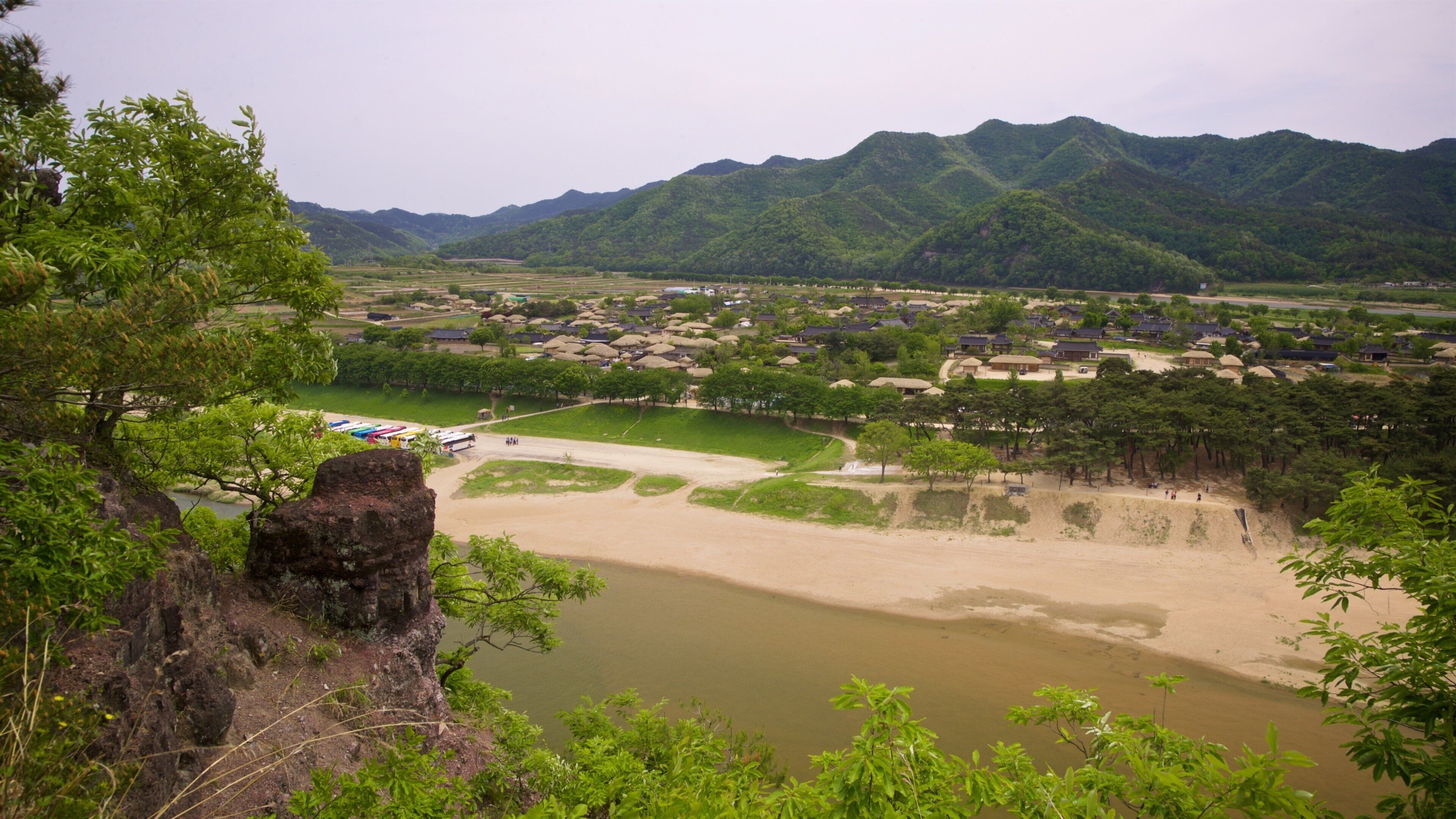 Buyongdae Cliff which includes tranquil scenes and landscape views