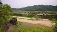Buyongdae Cliff which includes tranquil scenes and landscape views