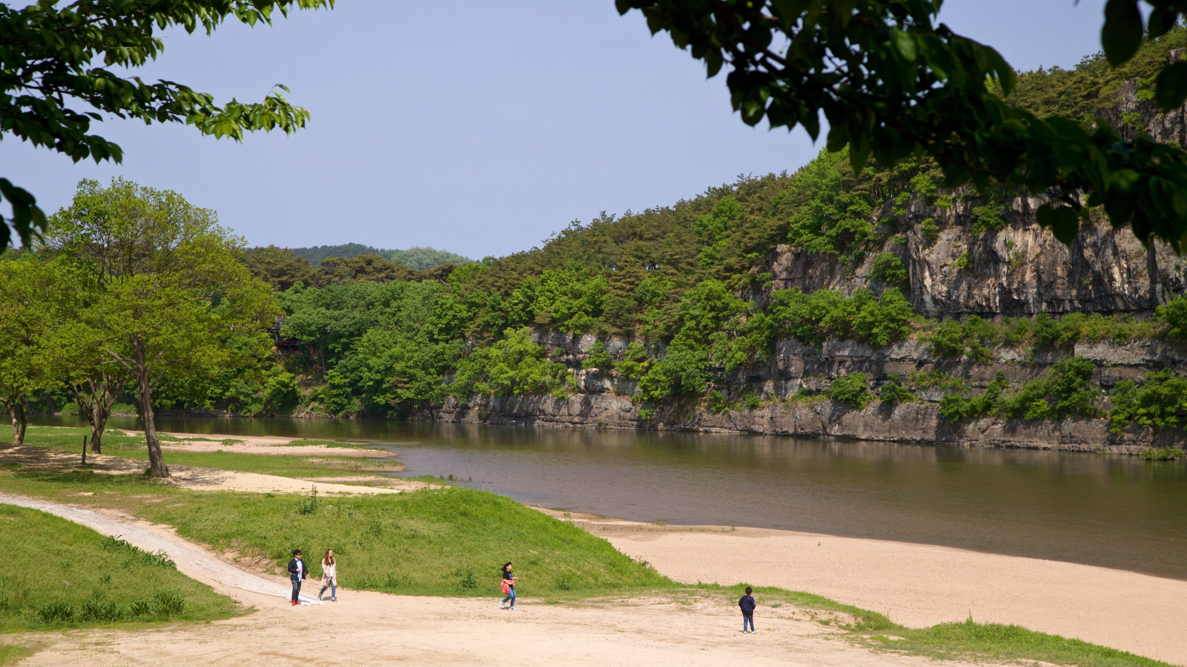 Buyongdae Cliff showing a river or creek and tranquil scenes