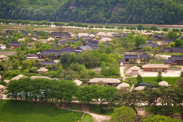 Buyongdae Cliff showing landscape views and a small town or village