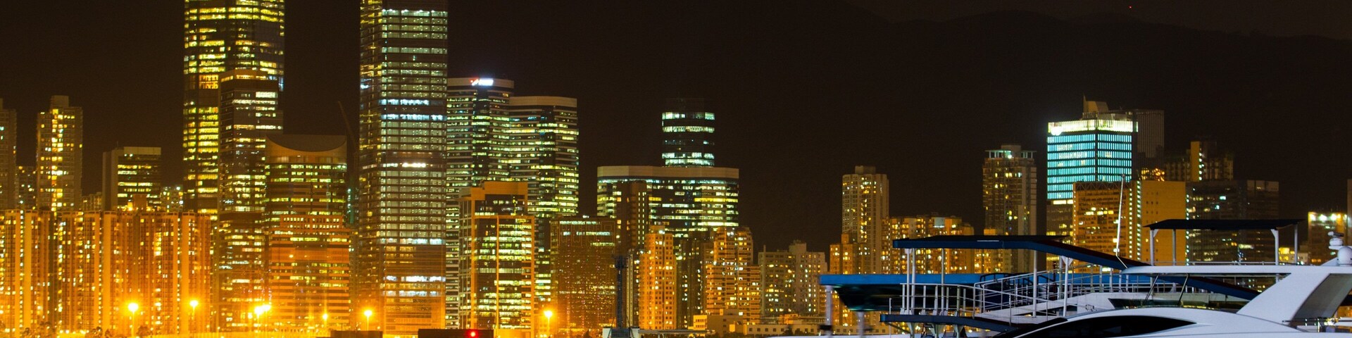 Hong Kong SAR which includes boating, night scenes and a bay or harbor