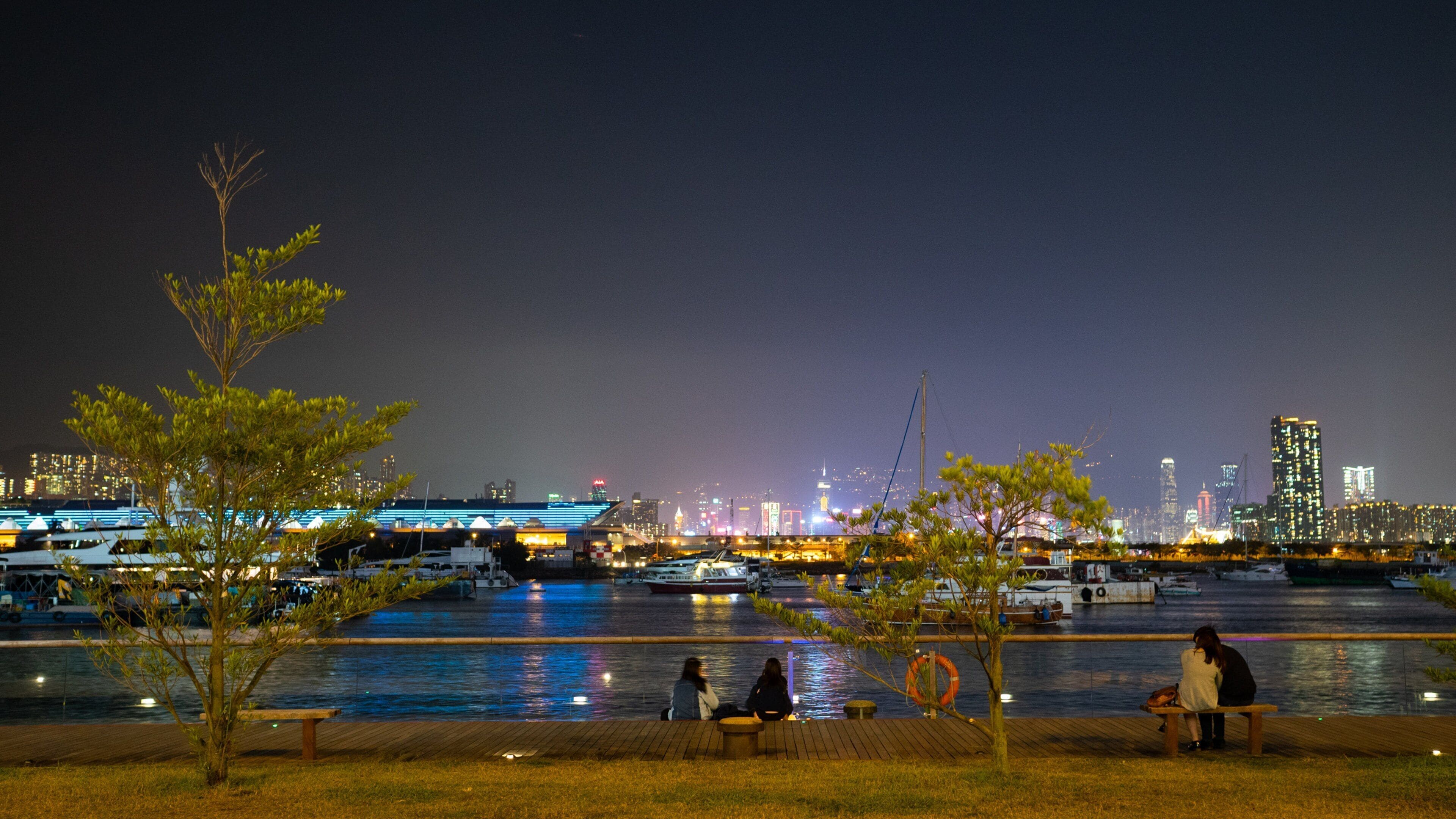 Kwun Tong Promenade which includes night scenes and a bay or harbor