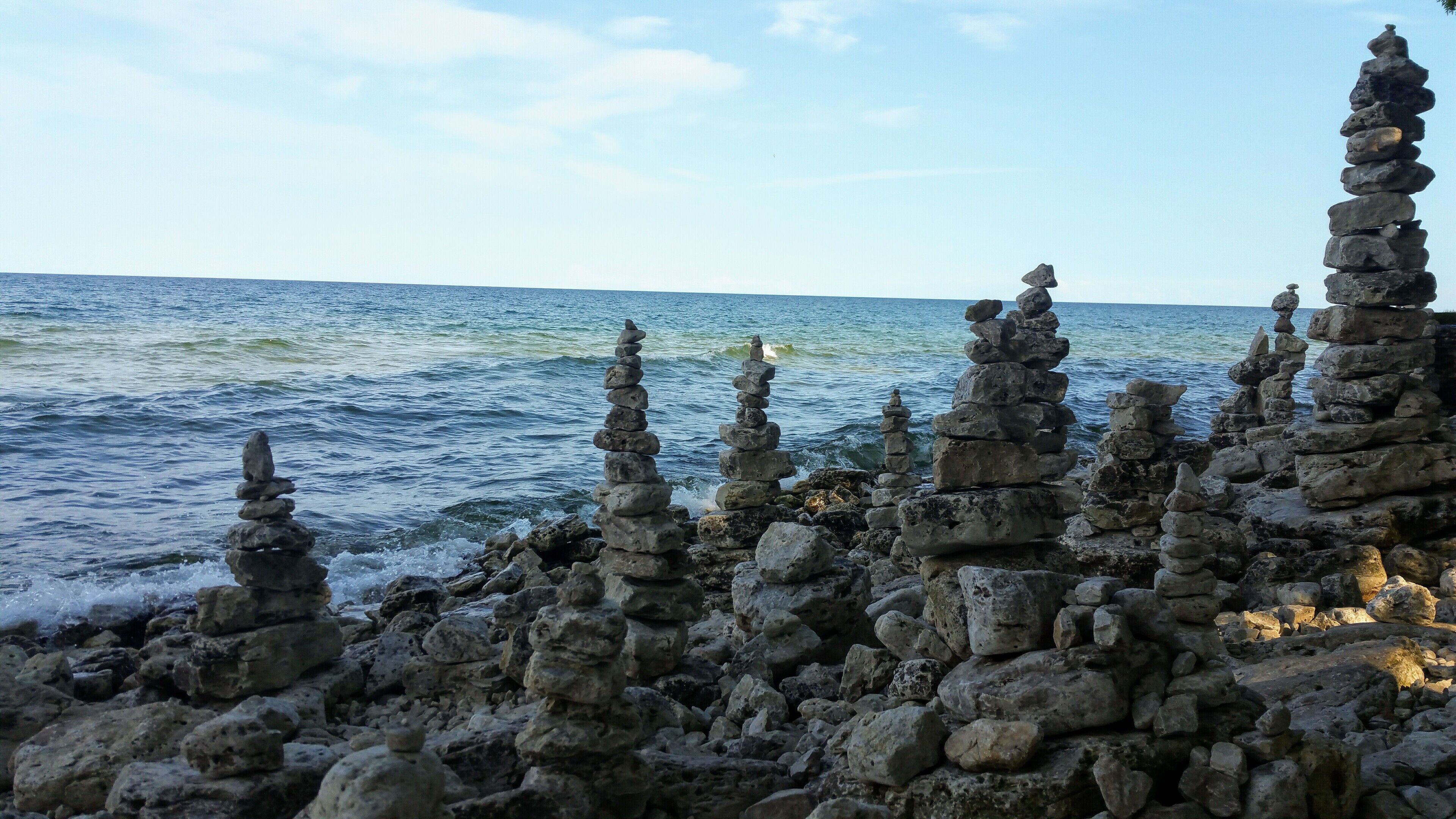 There is this place hidden in Cave Point County Park where people stack the stones from the shore. It's a really beautiful sight