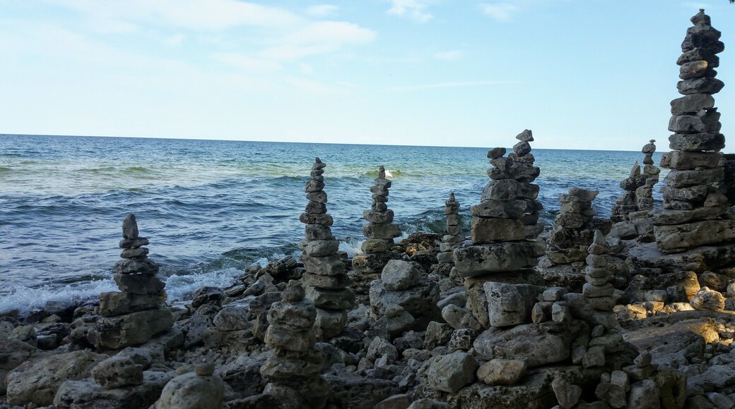 There is this place hidden in Cave Point County Park where people stack the stones from the shore. It's a really beautiful sight