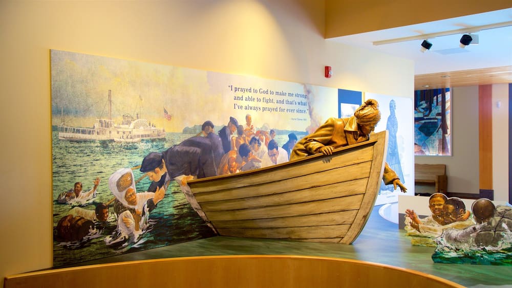 A mural of a boat with people and a quote about praying to God.