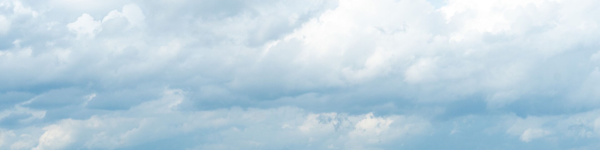 Horizontal view of river or reservoir
of Prasae Wang Chan of Rayong. Background of mountain far the way. Under the sky and white clouds.