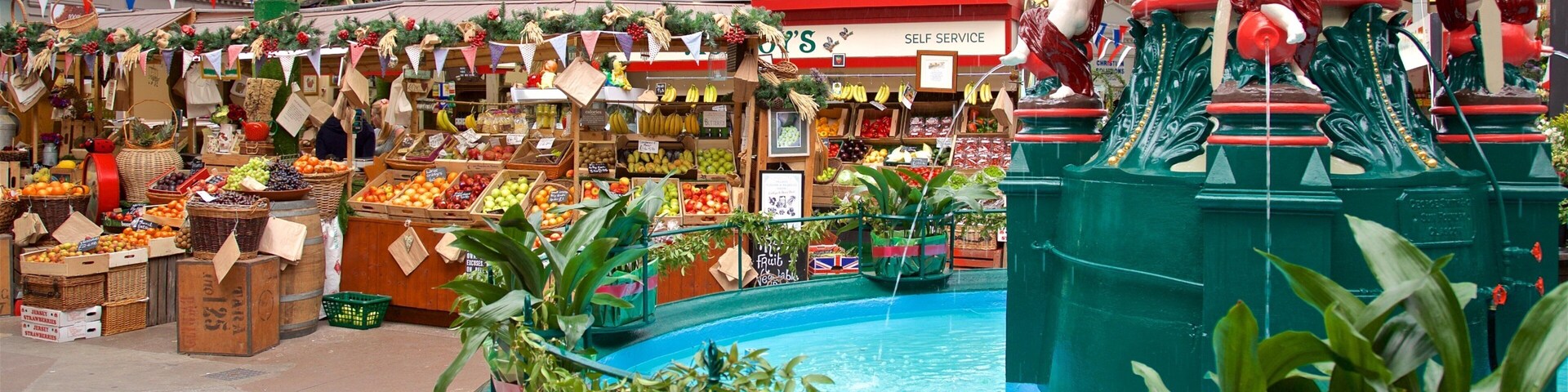 St. Helier Central Market showing a fountain and markets