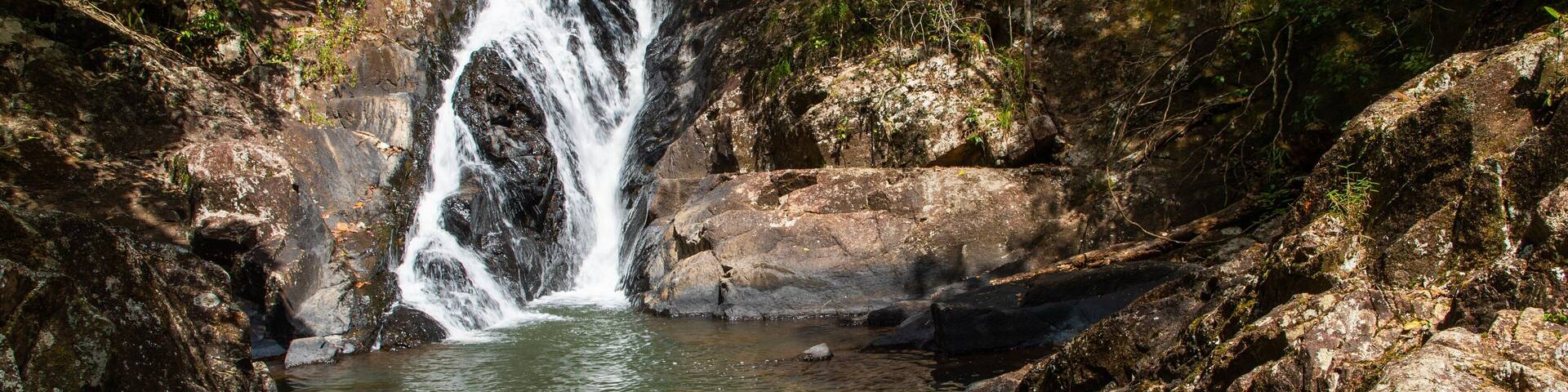 Mount Hypipamee National Park showing a cascade and a river or creek