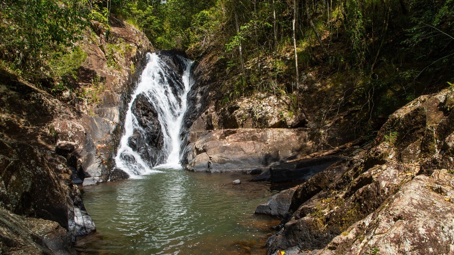 Mount Hypipamee National Park showing a cascade and a river or creek