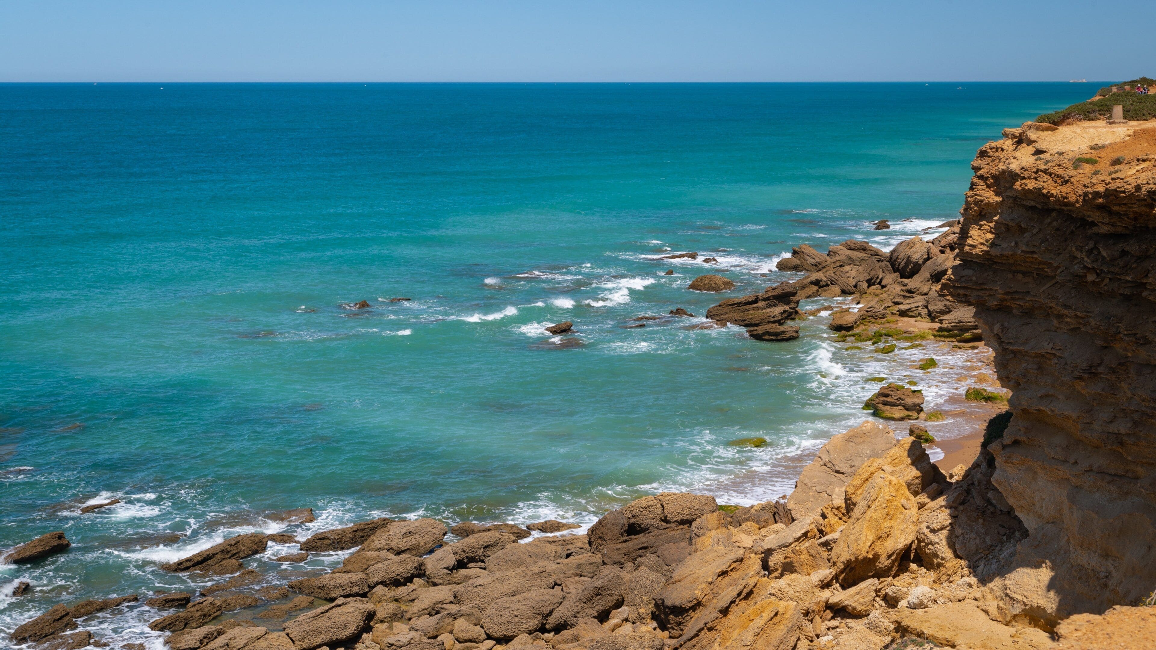 Cala del Faro showing general coastal views and rocky coastline