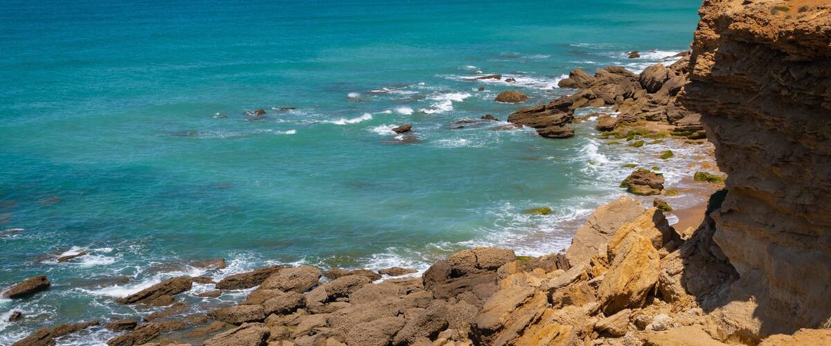 Cala del Faro showing general coastal views and rocky coastline