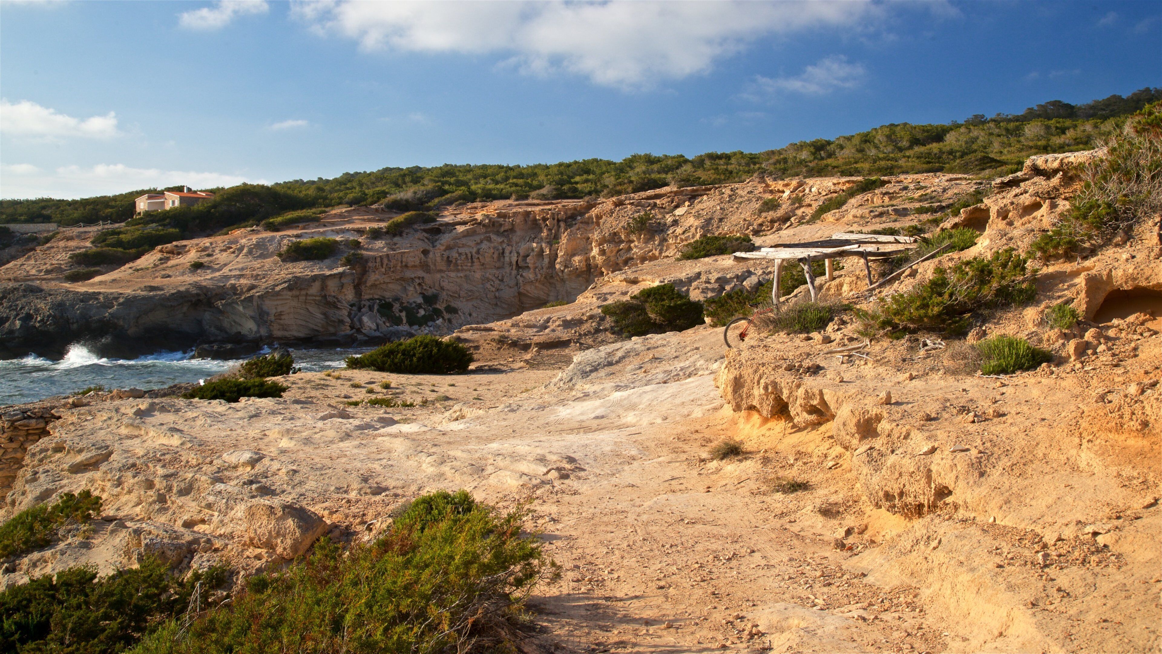 Caló des Mort showing rugged coastline and general coastal views