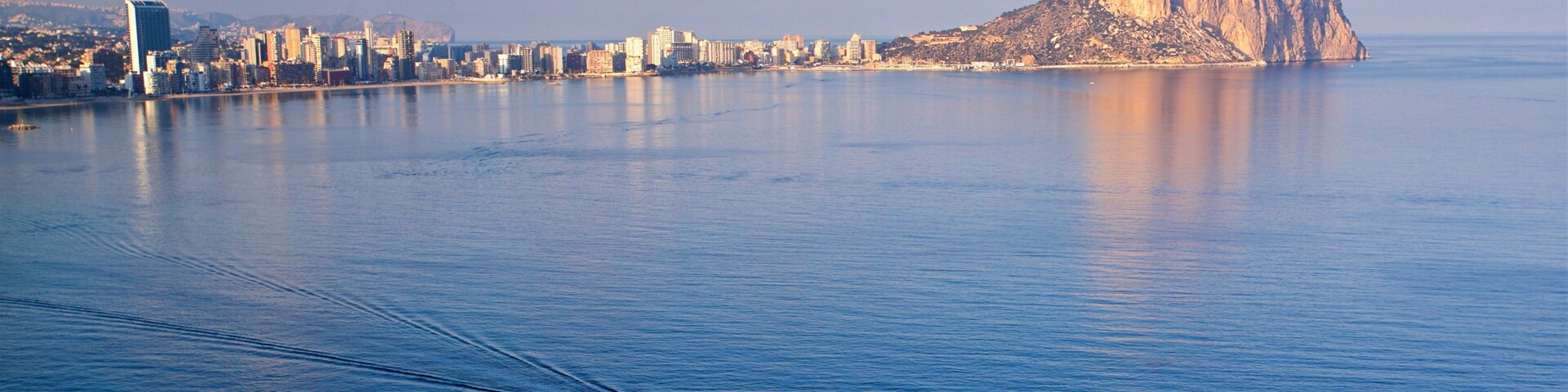 Cala de Gasparet showing boating, a sunset and landscape views