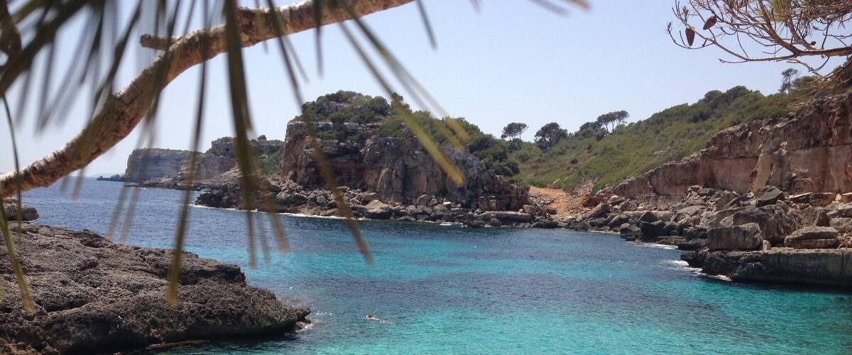 the water is cristal clear, perfect for snorkeling - there is a very small sandy beach, or you can jump from the cliffs into the water