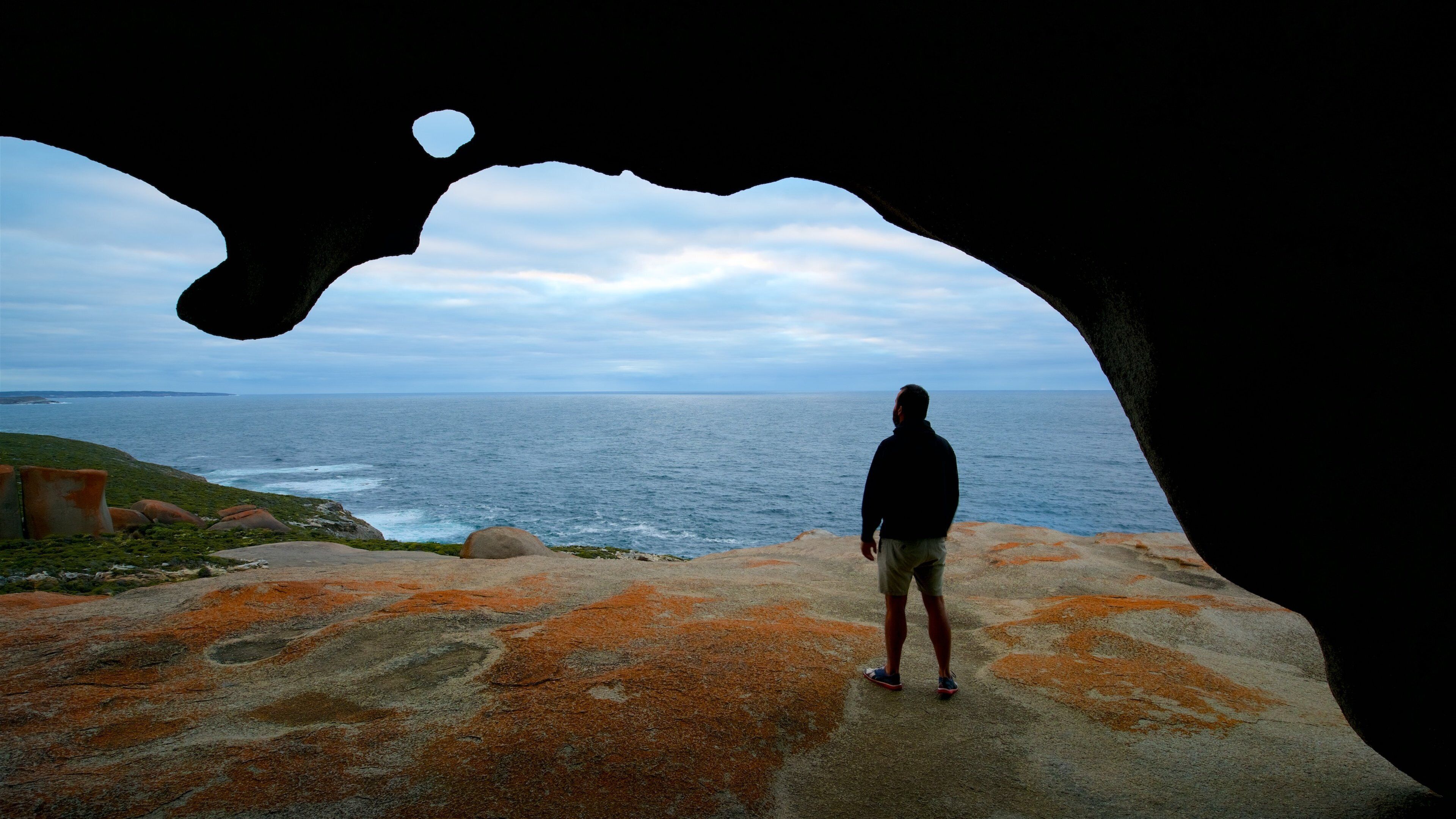 Remarkable Rocks showing rugged coastline and general coastal views as well as an individual male