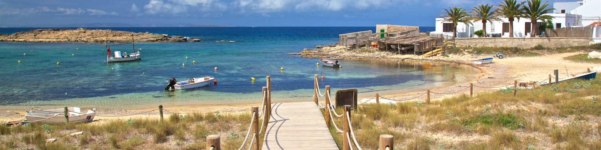 Punta Alta which includes general coastal views and a sandy beach