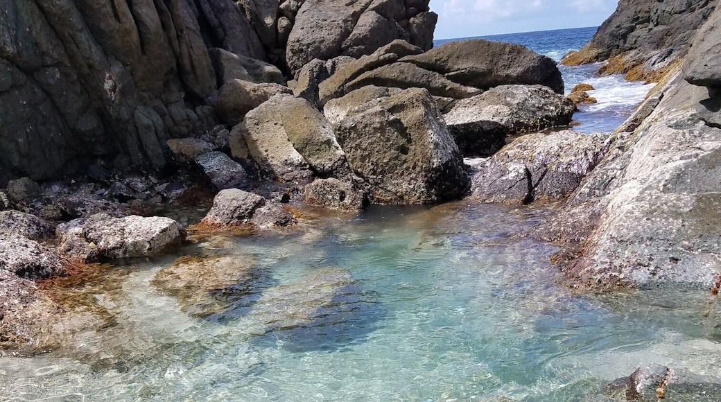 Great spot on Jost Van Dyke. When there is a north swell, the waves crash inyo the rocks and throw foam into the pool
