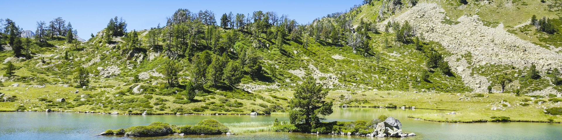 Little island over the Lac de Bastan, Saint Lary Soulan, Shutterstock ID 473822845, Purchase Order: -