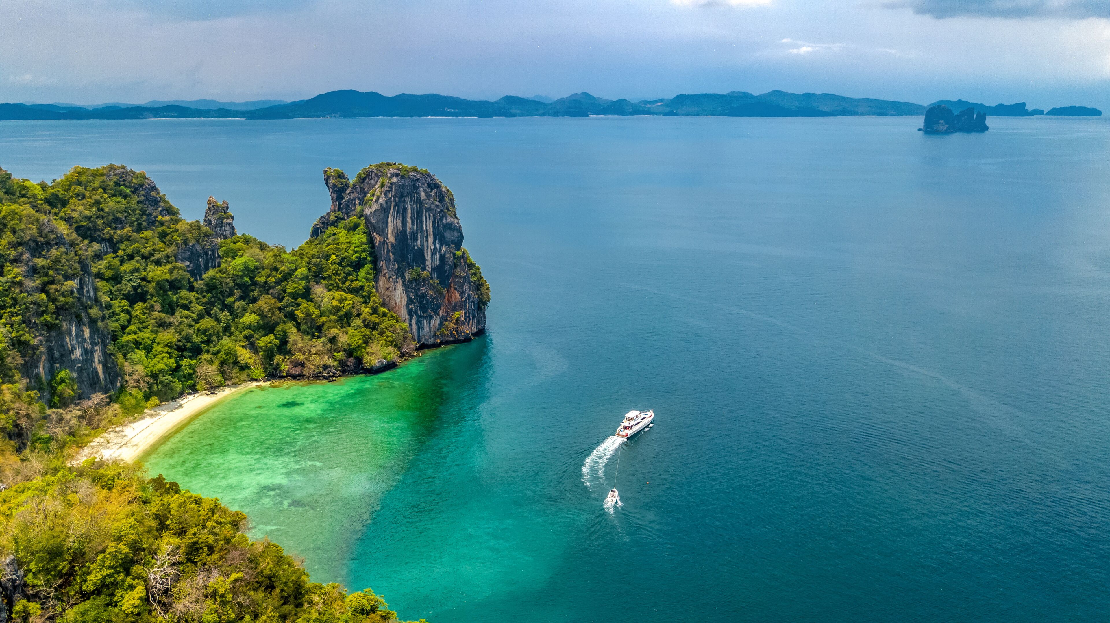 Aerial drone view of tropical Koh Hong island in blue clear Andaman sea water from above, beautiful archipelago islands and beaches of Krabi, Thailand