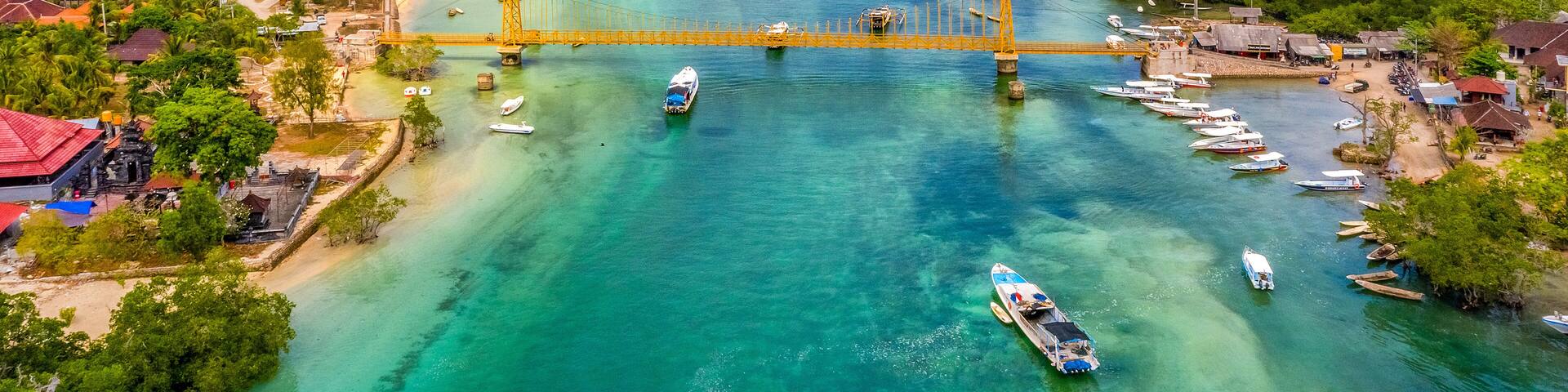Aerial view of Yellow bridge between the islands of Nusa Ceningan and Nusa Lembongan, Bali in Indonesia