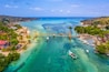 Aerial view of Yellow bridge between the islands of Nusa Ceningan and Nusa Lembongan, Bali in Indonesia