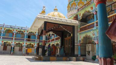 INDIA, MAHARASHTRA, PAITHAN, June 2015, Devotee at Geeta Mandir, Sant Dynaneshwar Udyaan