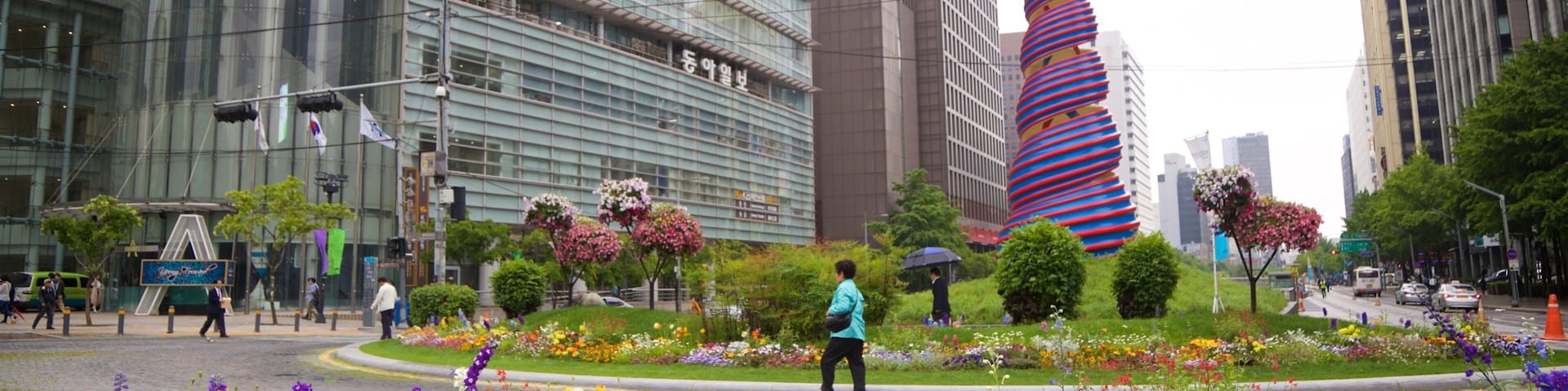 Cheonggye Plaza featuring wildflowers, a city and outdoor art