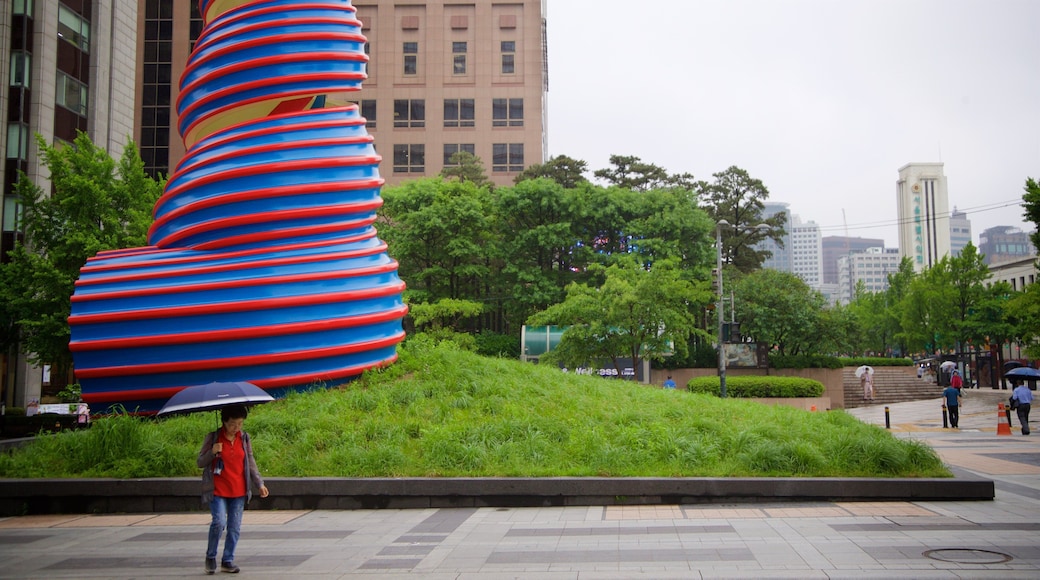 Cheonggye Plaza which includes a city, a park and outdoor art